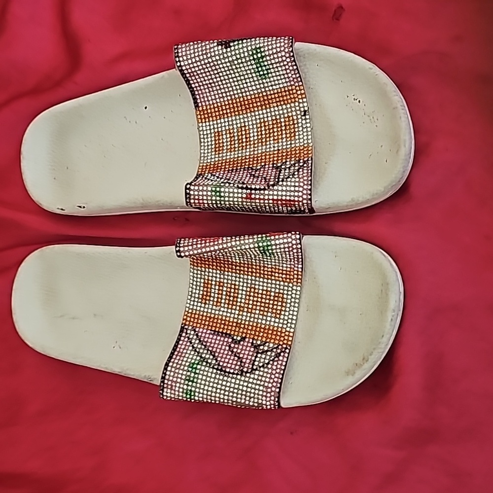 Never worn slides with money print of ten thousand dollar bills and